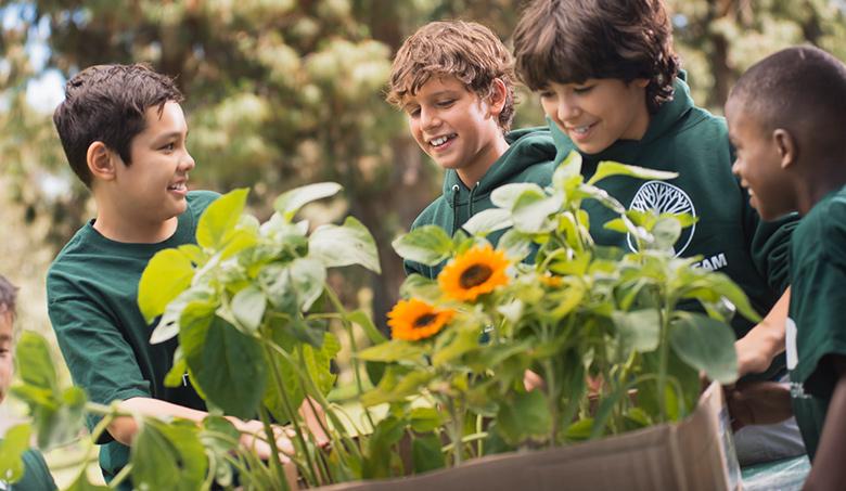 School-boys-laughing-gardening-class